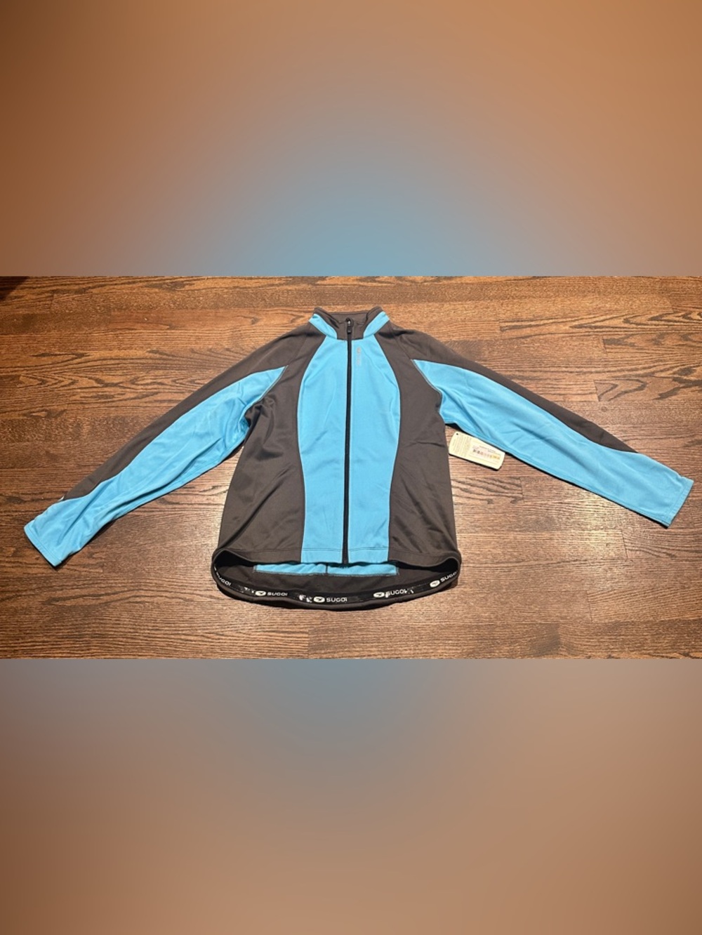 NWT SUGOI Azure Women's HotShot III Cycling Jersey